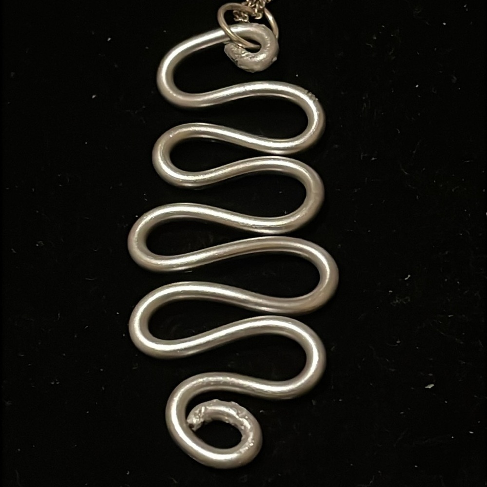 Elegant Silver Wave Hand Design Necklace - Picture 9 of 17